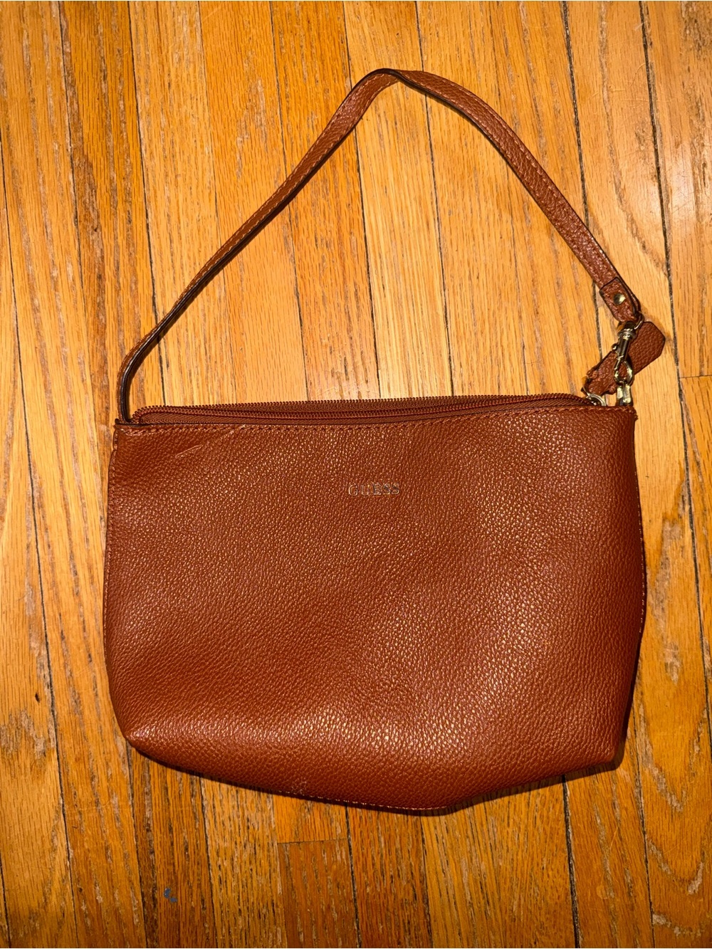 Guess Pebbled Leather Wristlet in Chestnut Brown